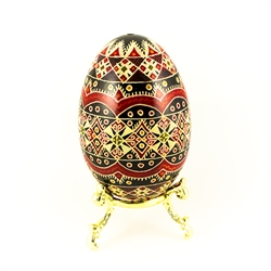 This beautifully designed and executed turkey egg is hand painted by our artist from Canada using the traditional batik method. The egg has been emptied through two small holes at each end of the egg. Stand sold separately.