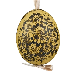 This beautifully designed brown chicken egg is hand painted. The painting is done in a traditional style from Opole. Ready to hang. Eggs are blown and can last for generations. Designs vary.