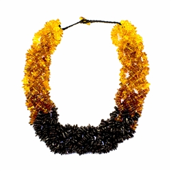 Composed of five strands of woven honey and cherry amber beads.  22" long necklace weighing 108g. A gorgeous necklace for amber lovers everywhere.