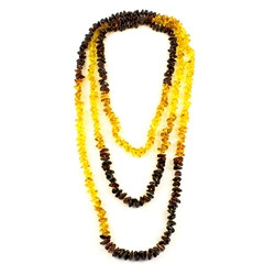 This beautiful amber necklace showcases a variety of amber shades. The beauty of this necklace will last a lifetime. Knotted between each bead.