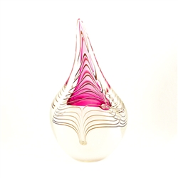 Two-sided art glass paperweight, with a gorgeous cranberry and white interior core with a peacock feather design, in a classic teardrop shape. Each piece is hand blown and hand finished in Poland. Made with the highest quality craftsmanship.