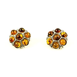 These Sterling Silver and Baltic Amber Daisy stud earings are a pleasant way to make summer last forever. A total of seven amber stones.