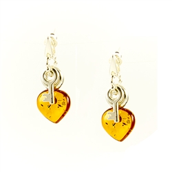 Honey amber hearts and a sterling silver key make quite the pair.