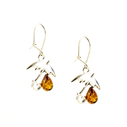 Genuine amber drops falling from these charming sterling silver umbrellas.