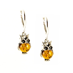 Charming sterling silver owl earrings with green amber eyes and honey tummy's.