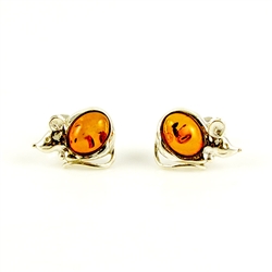 Our cute little sterling silver mouse features a tummy made of honey amber.