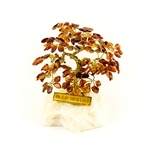 The leaves of this bonsai style tree are made with real polished amber stones attached to branches and trunk of twisted brass wire. The tree sits atop a piece of the finest Polish marble called "Marianna". Brass tags are available in either English or Pol