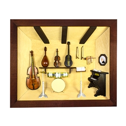 Poland has a long history of craftsmen working with wood in southern Poland. Their workshops produce beautiful hand made boxes, plates and carvings. This shadow box is a look inside a music studio. Note the nice attention to detail. Entirely made by hand.