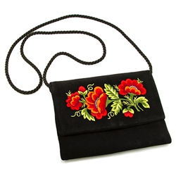 Hand embroidered clutch purse made from velvet. Fully lined. Extra long strap (extends to 25"). Snap closure. Made in Lowicz, Poland. Flower colors and design vary slightly from purse to purse.