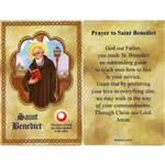 St Benedict Holy Card This unique prayer card contains a third class relics on the front with the prayer on the back. Please note that these are third class relics and are not first or second class with a piece of cloth touched to the relics.