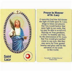 St Lucy Holy Card This unique prayer card contains a third class relics on the front with the prayer on the back. Please note that these are third class relics and are not first or second class with a piece of cloth touched to the shrine.
