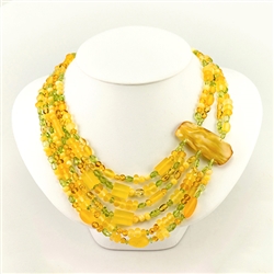 Bozena Przytocka is a designer of artistic amber jewelry based in Gdansk, Poland. Here is a beautiful example of her ability to blend amber and peridot to create a stunning necklace.