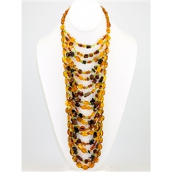 Bozena Przytocka is a designer of artistic amber jewelry based in Gdansk, Poland. Here is a beautiful example of her ability to blend multiple shades of amber and peridot to create a stunning necklace.