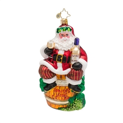 This ornament features Santa Claus sitting on a barrel that says "Santa's Wine Cellar" with a glass of white wine in his hand.