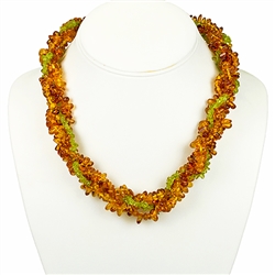 Bozena Przytocka is a designer of artistic amber jewelry based in Gdansk, Poland. Here is a beautiful example of her ability to blend amber and peridot to create a stunning necklace.