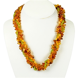 Bozena Przytocka is a designer of artistic amber jewelry based in Gdansk, Poland. Here is a beautiful example of her ability to blend amber and peridot to create a stunning necklace.