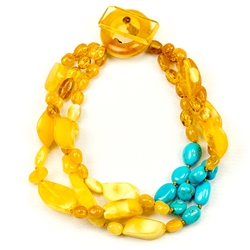 Bozena Przytocka is a designer of artistic amber jewelry based in Gdansk, Poland. Here is a beautiful example of her ability to blend amber and turquoise to create a stunning bracelet.