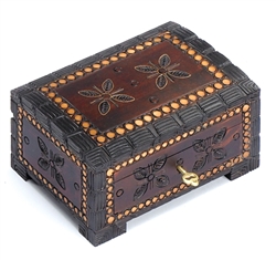 Chest style box with deep carved border and floral design accented with metal inlay. Lock and key.