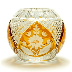This is genuine Polish hand-cut leaded crystal with a floral design.  Amber colored background.