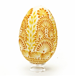 This beautifully designed egg is "painted" with pure beeswax using the "drop pull" technique. The wax design is left on the egg.
We have a variety of designs and no two are exactly alike. The goose eggs have been emptied. Hand made in Poland.