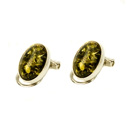 Beautiful pair of oval shaped silver cuff links highlighted with oval amber centers.