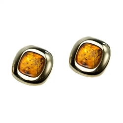 Beautiful pair of clip amber earrings in a sterling silver frame.