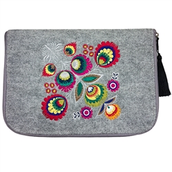 Cover made of stiff grey felt. Main decoration is vivid embroidery - Lowicz Flowers (made by Farbotka brand). Quilted lining and pocket inside. 
Finished with  tassel. Each cover has a brand logo inside.  Lining on this model is red