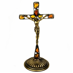 Hand made in Gdansk, the beautiful crucifix is made with natural Baltic amber embedded in an artistic cross. Brass base and body of Christ. Removable base.