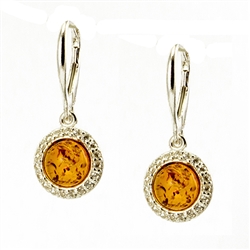 Beautifully designed classic silver setting for these honey shaded amber stones.  Sterling silver open hooks.