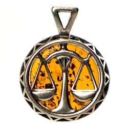 Hand made Cognac Amber Libra pendant with Sterling Silver detail. September 23 - October 23.