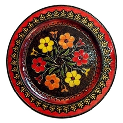 Beautiful floral design. No two plates are exactly alike. Our artist creates the basic floral design but uses slightly different stains and colors so the each plate is unique. Highly detailed.