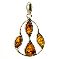 Sterling Silver Filigreee Pendant With Honey Amber. Amber (Bursztyn in Polish) is fossilized tree sap that dates back 40 million years. It comes from all around the world, but the highest quality and richest deposits are found around the Baltic Sea