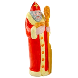 This St. Nicholas was carved and painted by Polish folk artist This St. Nicholas was carved and painted by Polish folk artist Leszek Pliniewicz. Mr. Pliniewicz's works are quite interesting and in a "primitive" style. Carved from one piece of wood.  Size