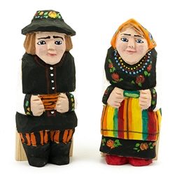 Hand carved and painted by folk artist Tadeusz Lesniak, our little couple is dressed in Lowicz costume from central Poland.