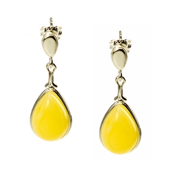 Custard Amber Teardrop Earrings set in Sterling Silver with post backs.  Amber is soft, only slightly harder than talc, and should be treated with care.Amber is soft, only slightly harder than talc, and should be treated with care.