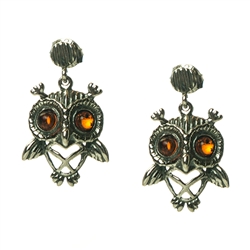 Charming sterling silver owl earrings with cognac amber eyes.