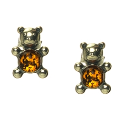 Our cute little sterling silver teddy bears features a tummy made of cognac amber.