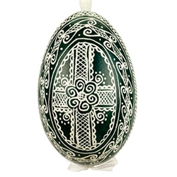 This beautifully designed egg is dyed one color, then white wax is melted and applied to form an intricate design which is left on the surfce. The egg is emptied and strung with ribbon for hanging or you can remove the ribbon. This is the work of master