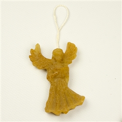 This pure beeswax angel is hand made by the residents of Dom Teczowy, a home for the mentally impaired located in Sopot, Poland. Your purchase helps to support the Dom Teczowy Foundation that provides the care for the residents.