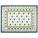 Large Polish cloth placemat featuring Polish stoneware colors and floral design. This material is 100% polyester.. Made in Poland.