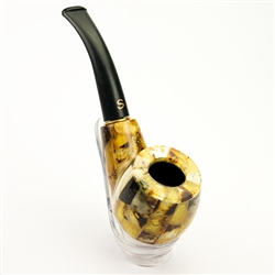 A tobacco pipe clad in amber pieces.  Made In Lithuania.