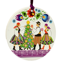 A colorful and light (but sturdy) laminated disc ornament featuring Polish carolers In Lowicz costumes.  Ready to hang with it's own ribbon hanger. Similar to a thin paper coaster approx 3ml thick.  Made in Poland