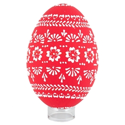 This beautifully designed egg is dyed one color then white wax is melted and applied to form an intricate design which is left on the surface. The egg is emptied. Stand not included.