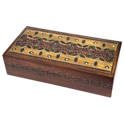 This box features a beautifully detailed leaf design in muted shades. Brass inlays in the lid and carvings along the side of the box complete the item. The box is handmade in the Tatra Mountain region of Poland.  Handmade in Poland's Tatra Mountain region