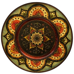 Hand Made in Southern Poland Polish wooden plates are made from Linden wood in the mountain region of southern Poland called Podhale. The plates are cut and shaped on a lathe by hand. The floral designs are burned into the wood then painted after staining