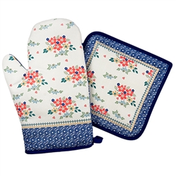 Colorful set of decorative mitt and holder set featuring a traditional Polish stoneware design. 100% polyester.  These mitts are more decorative than useful as they do not have effective insulating material. Decorative only - not intended to handle heat.