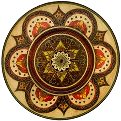 Hand Made in Southern Poland Polish wooden plates are made from Linden wood in the mountain region of southern Poland called Podhale. The plates are cut and shaped on a lathe by hand. The floral designs are burned into the wood then painted after staining