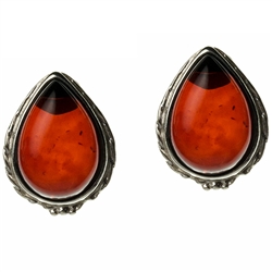 Artistic tear drop shaped silver post back earrings with a center of cherry colored amber.