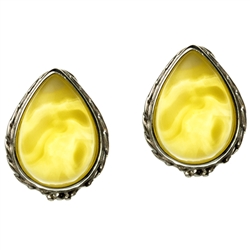 Artistic tear drop shaped silver post back earrings with a center of custard colored amber.