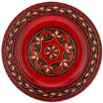 Polish wooden plates are made from Linden wood in the mountain region of southern Poland called Podhale.  The plates are cut and shaped on a lathe by hand.  The floral designs are burned into the wood then painted after staining and varnishing.